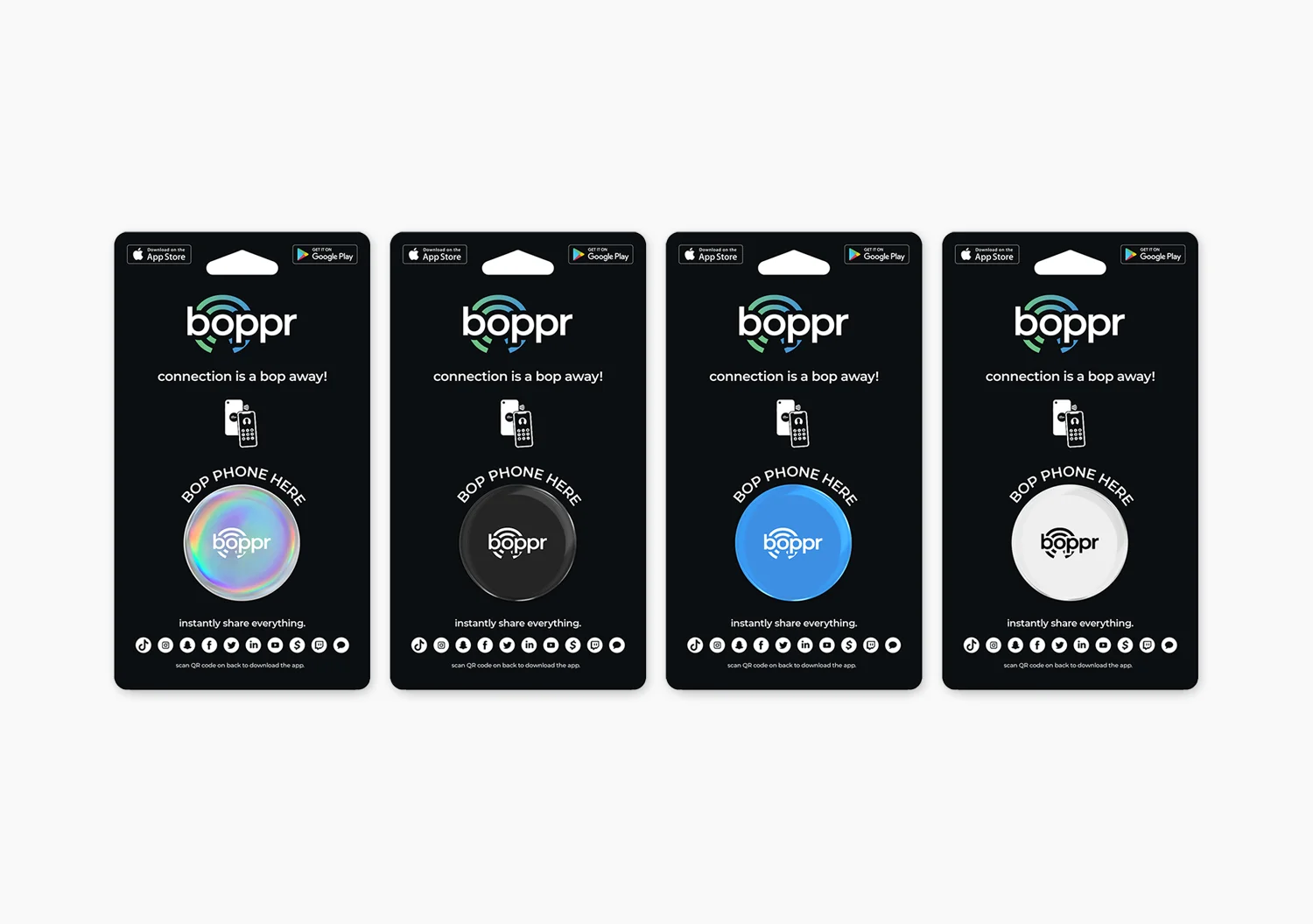 Four Boppr retail blister packs in black, each with a different “Bop Phone Here” disc — holographic, black, blue, and white
