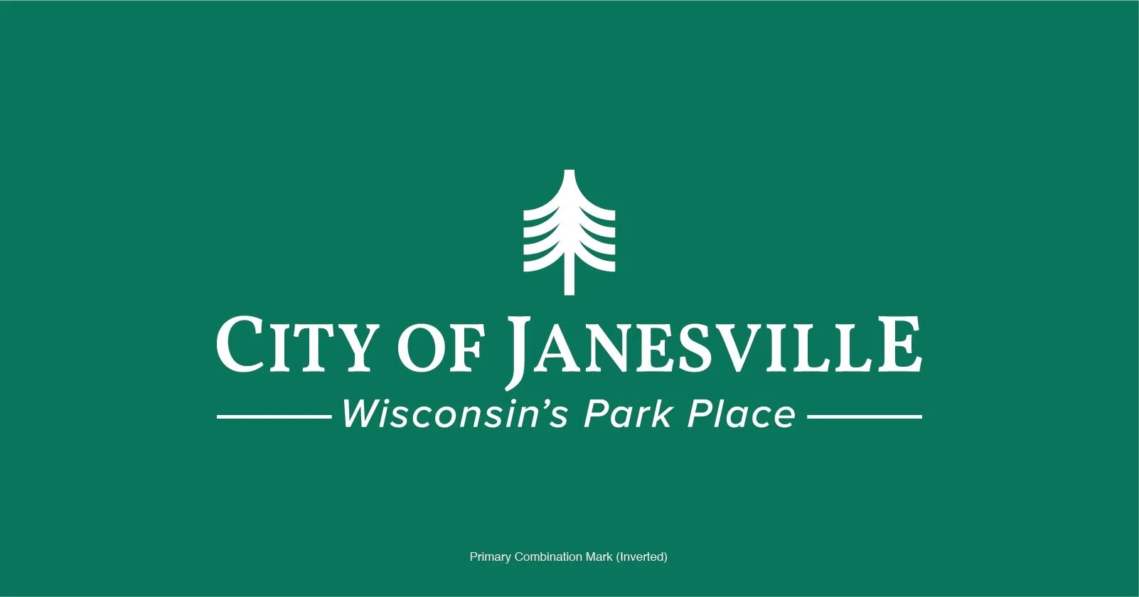City of Janesville primary combination mark — a white pine tree above the wordmark and the line “Wisconsin’s Park Place”, on forest green